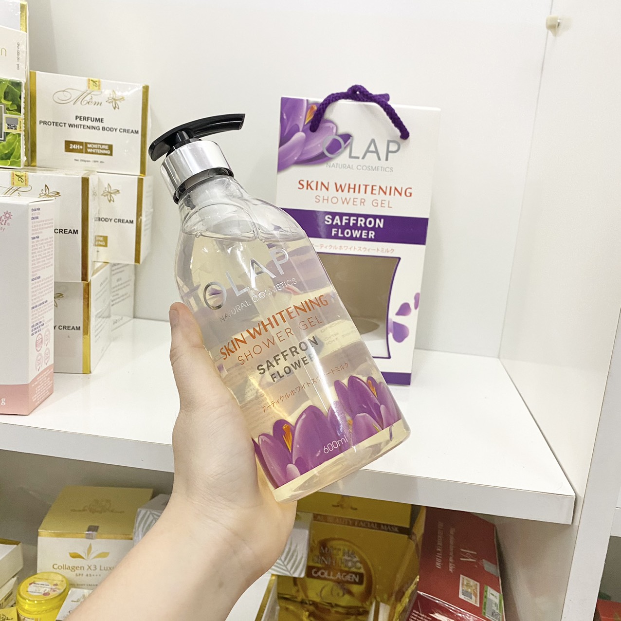 14805-z2940045971212-4779d232030df3ab432417c3d32e734f-4.jpg Sữa Tắm Trắng Da Olap French Màu Tím 600ml - 8938519955936