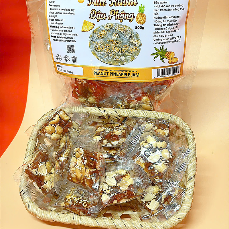 23380_z6125808222531-9a5b4016c4cc500be0d085618079817d_20241214103019-4.jpg Mứt Khóm Đậu Phộng Túi Zip 300g - MKDPTZ