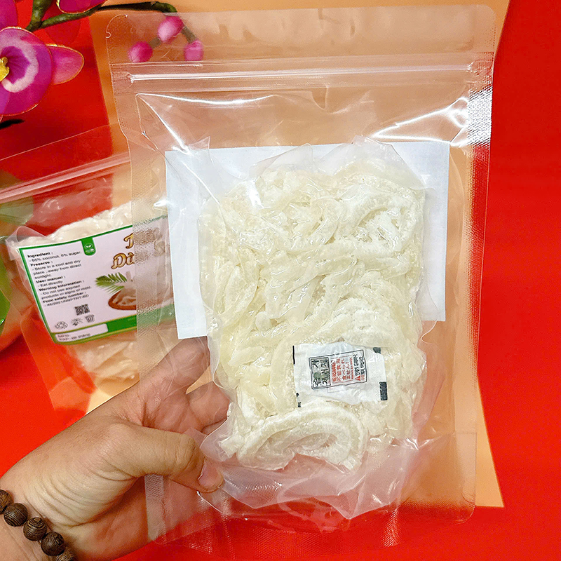 23383_z6129056907229-749fbd1f94aa384efbc90341dfb77e22_20241214124301-3.jpg Mứt Dừa Sợi Túi Zip 300g - MDNMHCK
