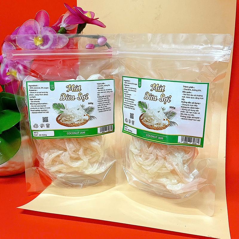 23383_z6129056912251-f9947e6cff752c9108ad35bb3d383c6a_20241214124301-1.jpg Mứt Dừa Sợi Túi Zip 300g - MDNMHCK