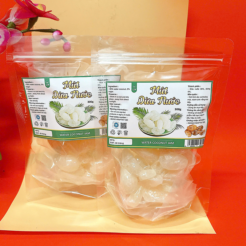 23385_z6125806455505-21d588baf946732d4defd03b29a5aa0d_20241214111451-2.jpg Mứt Dừa Nước Túi Zip 300g - MDNHCK