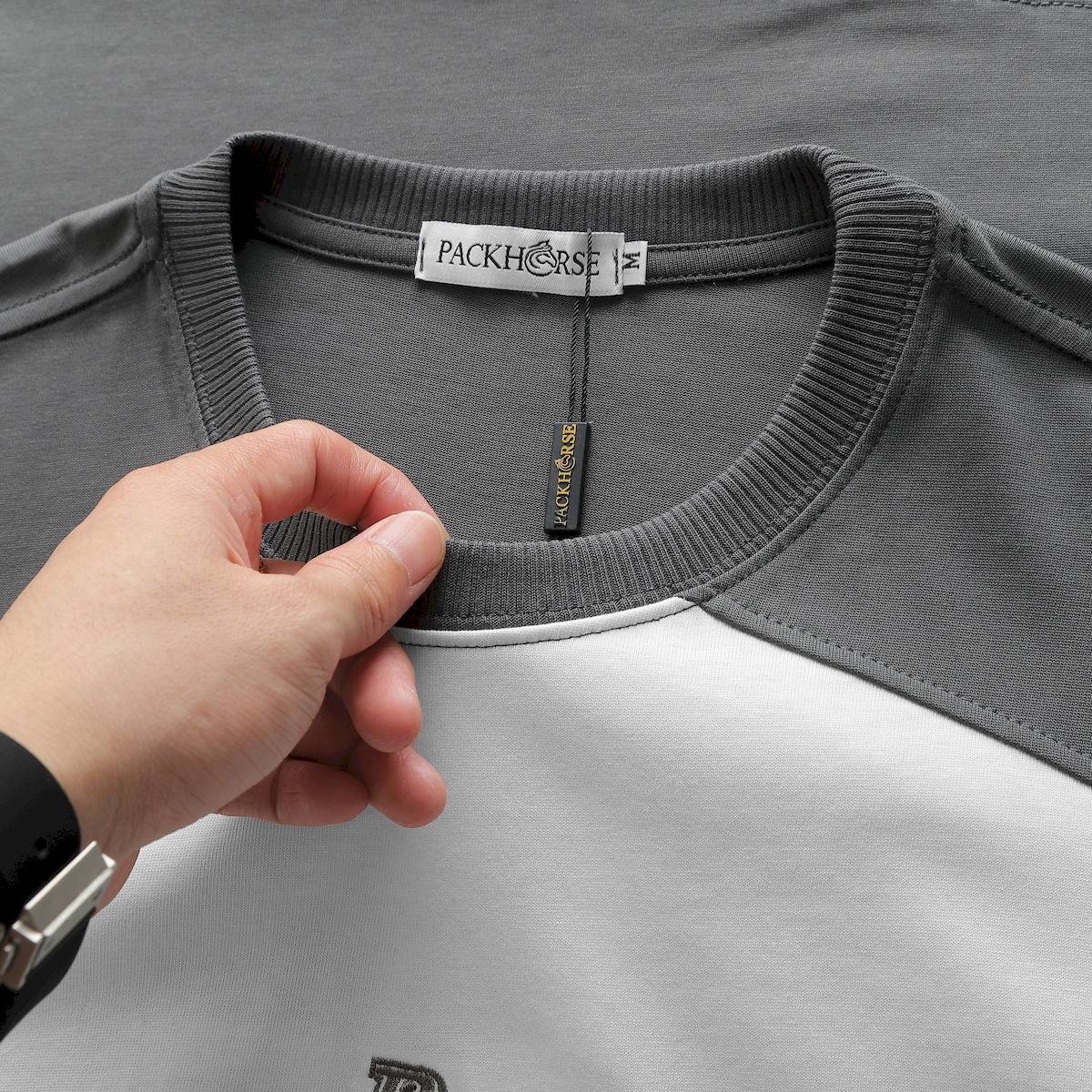 24093_z5363825519149-e5fea3d4bfe797c26ce9f9c8bb95fdc6_20240420025045-2.png Áo Thun Nam Cổ Tròn Oversize Tay Phối Màu Thêu Chữ PackHorse - AB512