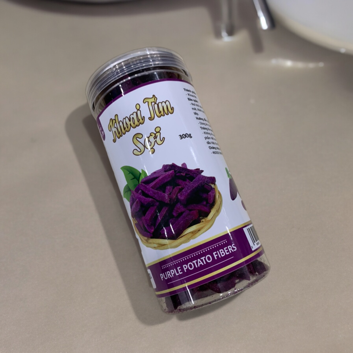 24447_z5494823765720-1c3c3612b98c916d035f6e0f3c6bb6c3-photoroom_20240601141726-3.png Khoai Lang Tím Sợi Cộng Giòn 300g - 8936208930912