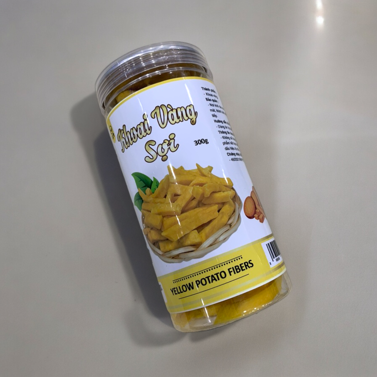 24448_z5494823835184-03fcc83e85d0c8b8585217139d1aa757-photoroom_20240601142641-3.png Khoai Lang Vàng Sợi Sấy Giòn 300g - 8936208930905