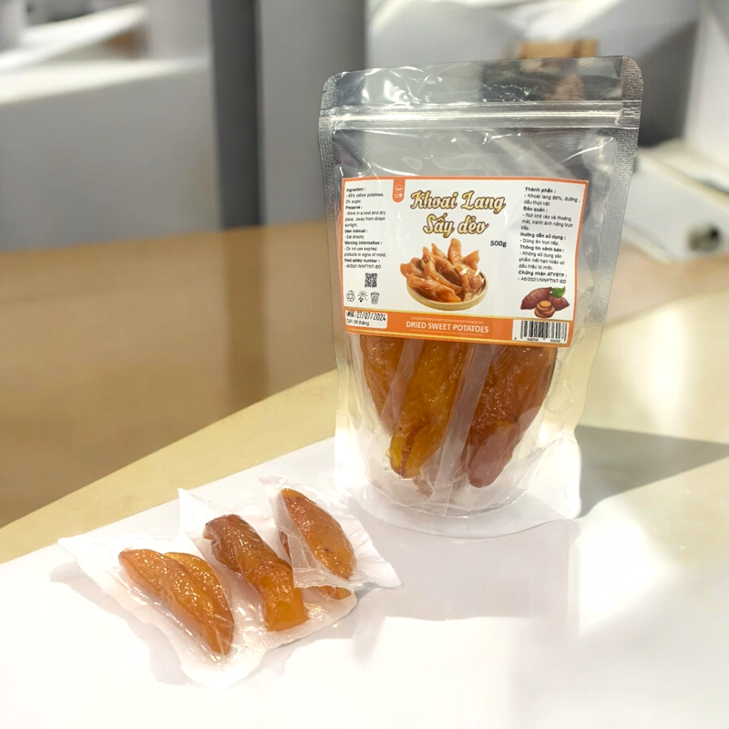 24745_z5672637010518-4b1fc5abdcf15990b95bc23ab65325e9-photoroom_20240727114223-4.png Khoai Lang Sấy Dẻo 500g - 8936208936068