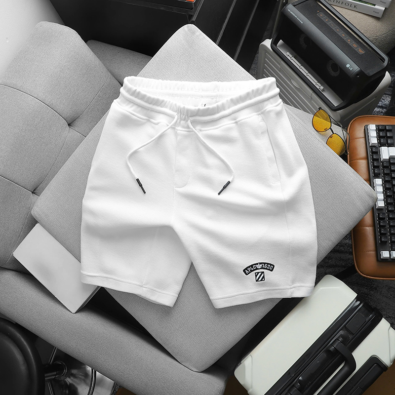 25833_z6074095038532-a6edce724b25eb79d0aa61017bc74802_20241210150520-1.jpg Quần Short Thun Nam Thêu Nổi Logo Chữ (Size Từ 50-80kg) - QB438