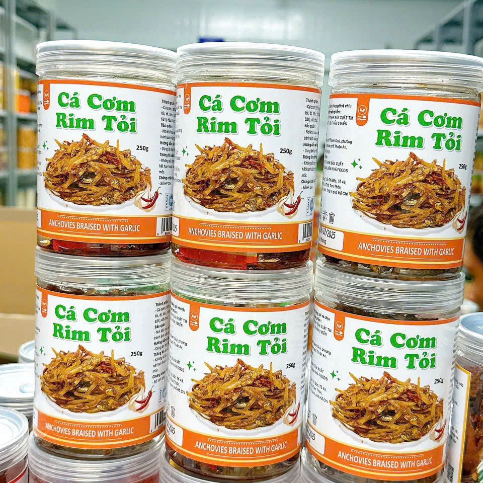 26229_z7198038414392-61ccc800f70bd67388827845410a5931_20251110173909.png Cá Cơm Rim Tỏi Thơm Ngon 250g Hộp - CCRT250G