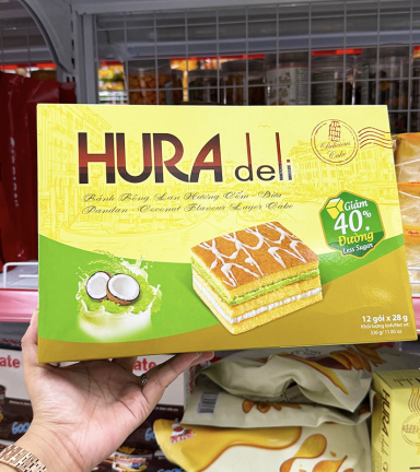 Bánh Bông Lan Bibica Hura Deli Hương Cốm Dừa 336g (12 Gói x 28g) - 8934609602322